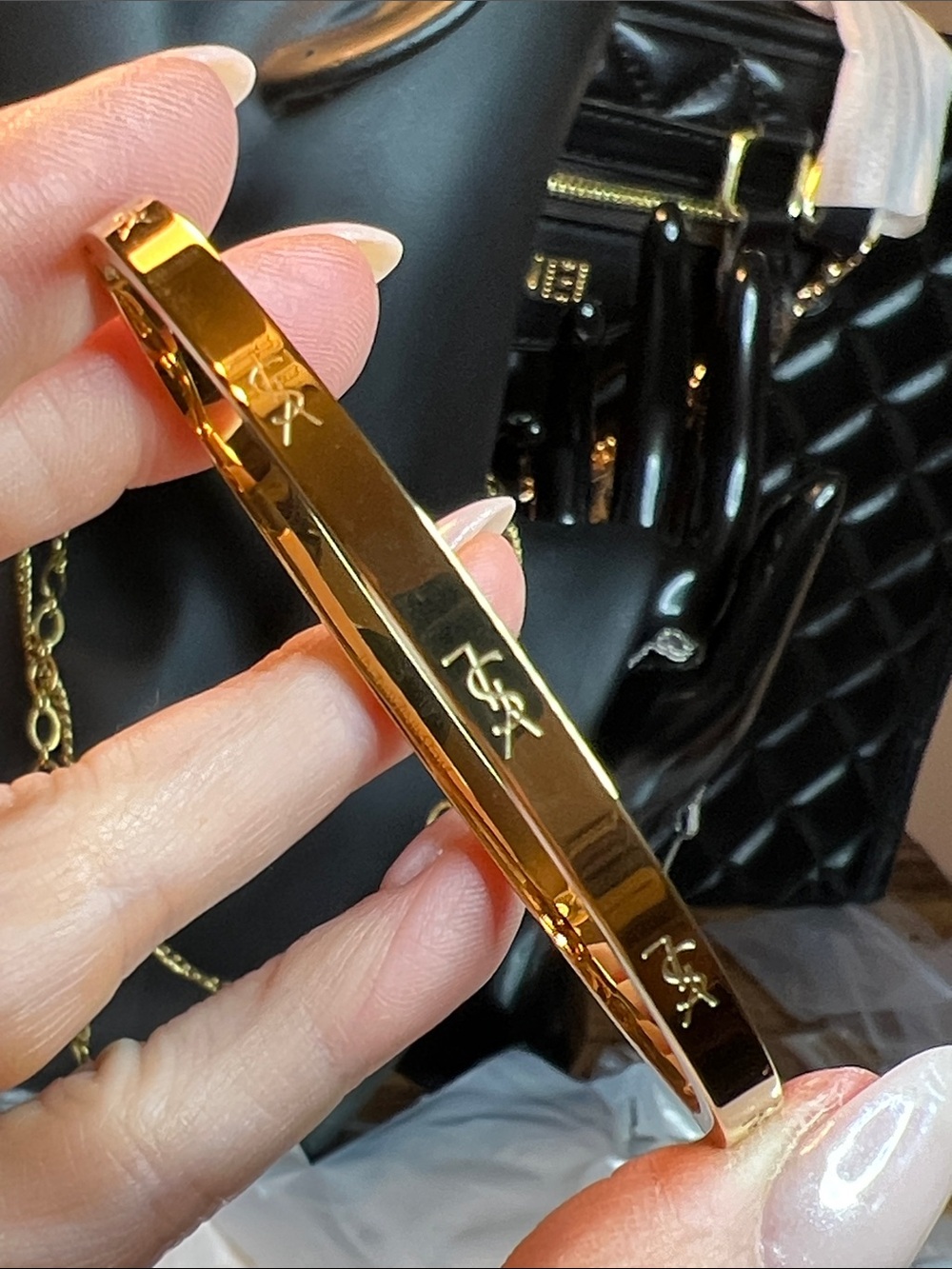 Gold Bangle Bracelet with Signature Logo Detail